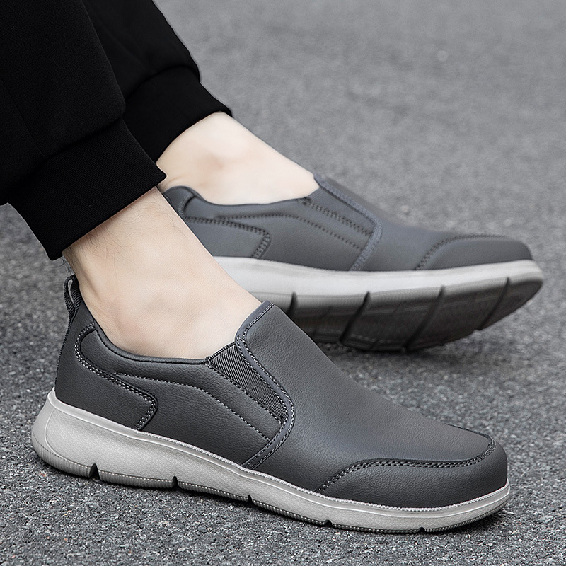 Nuevos zapatos de primavera y otoño deportes casuales, zapatos de marcha anti-deslizante, suela suave, mediana edad, Beijing, hombre de cuero