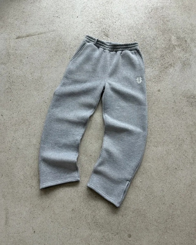 ヨーロッパとアメリカのクロスボーダー刺繍ジッパースウェットパンツカジュアルパンツハイストリートヒップホップラップストリートアメリカサイズの男性と女性のスウェットパンツ卸売|undefined