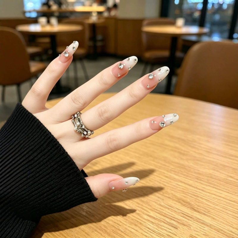 Pure and gentle, milky white gradient, handmade press-on nails, nude color, brightens the complexion, with sparkling rhinestones for a luxurious look, finished nail art Pure and gentle, milky white gradient, handmade press-on nails, nude color, brightens the complexion, with sparkling rhinestones for a luxurious look, finished nail art