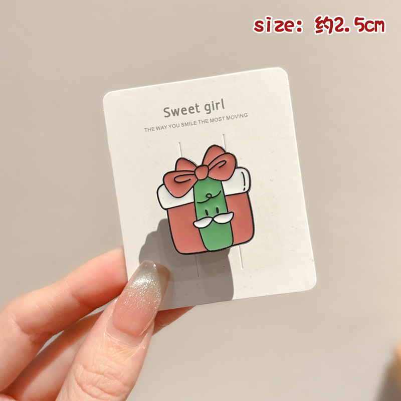 Broche de aleación de sentido avanzado japonés nueva insignia de personalidad de moda femenina de dibujos animados bolsa de Navidad accesorios de metal al por mayor