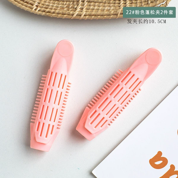 2 pieces of 22# pink fluffy clips