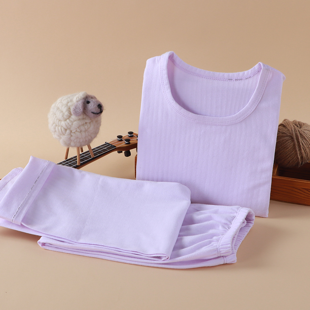 Nueva ropa infantil para el hogar sin huesos pijamas de manga larga primavera y otoño ropa de aire acondicionado de niñas algodón hombre