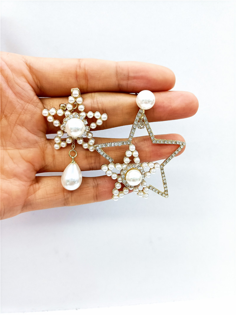 Korean New Flashing Diamond Five-pointed Star Pearl Exaggerated Asymmetric Earrings display picture 2
