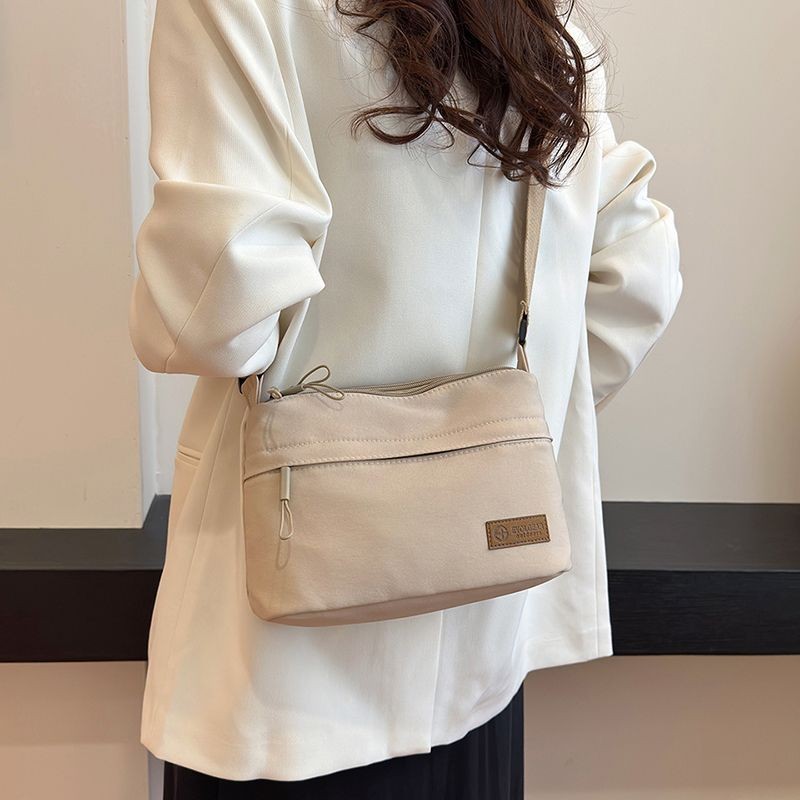 秋季新款男女同款布包日系时尚简约韩版单肩包隔层斜挎大容量女包