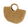 The new handbuk of the handbuk of the half moonlight simple fashion woven women's bag show paper rope round bucket bag