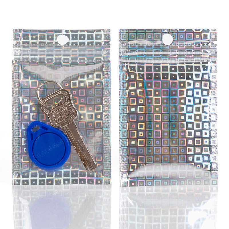 Láser ziplock bolsa de uñas de pestañas bolsa de embalaje de la joyería flash Yin y Yang bolsa de hueso Barra de papel de aluminio bolsa sellada al por mayor