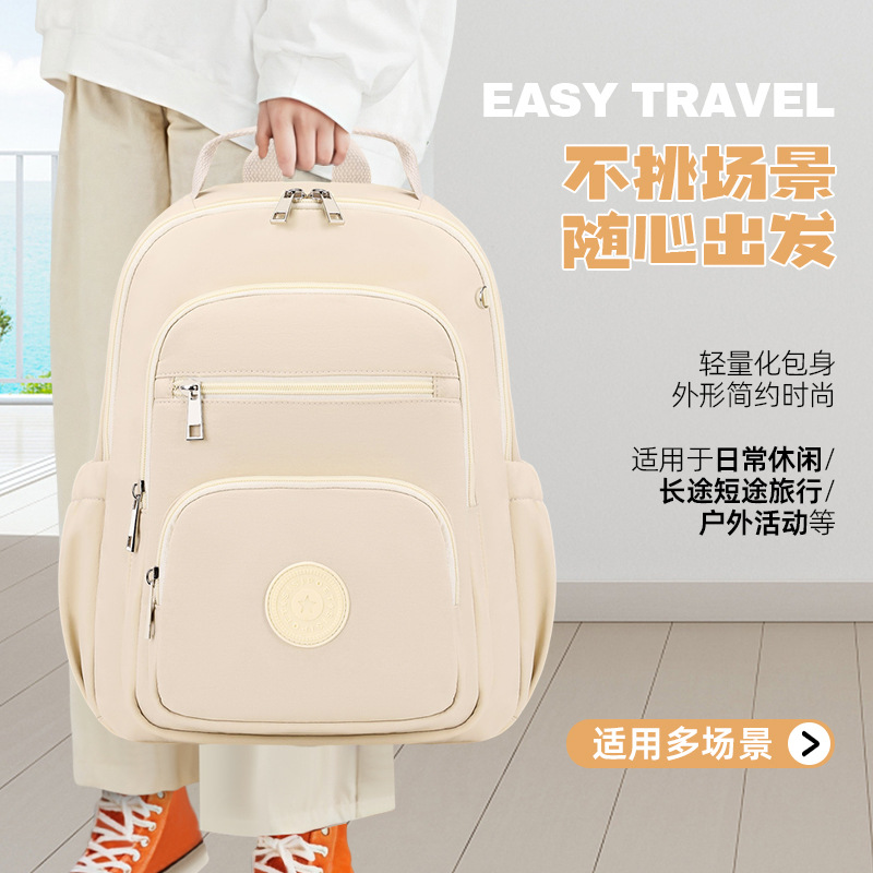 Mochila impermeable de gran capacidad para mujer, nueva colección 2025, venta al por mayor del fabricante, mochila de doble hombro de color sólido, bolso de gran capacidad con múltiples bolsillos