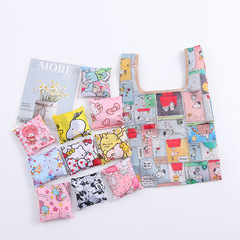 Cartoon small cute doll pattern foldable simple hand-held shopping bag portable mini eco-friendly bag hand bag