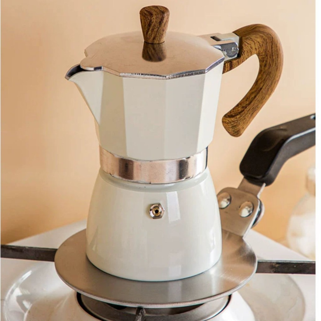 Nuevo Moka pot placa de conducción de calor cafetera de cerámica cristalería cocina de inducción placa de conducción de calor al aire libre conducción de calor de acero inoxidable