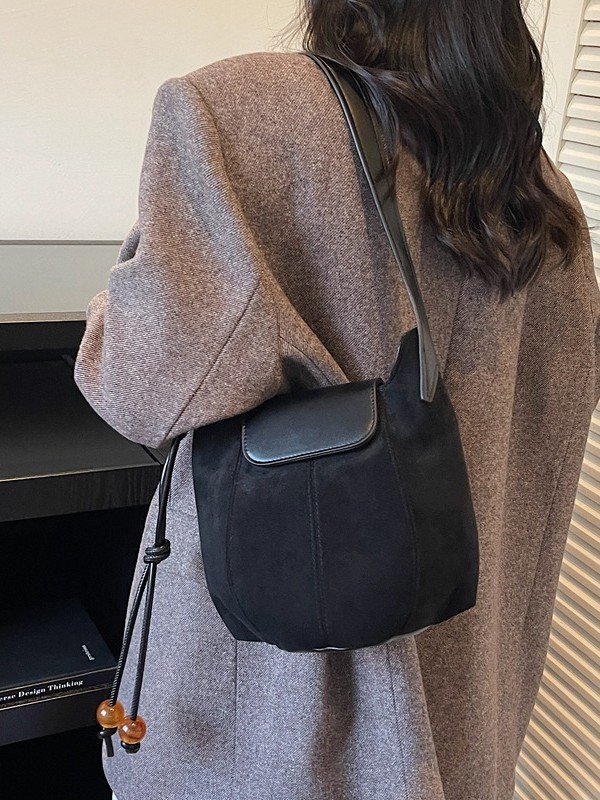 Otoño y invierno bolsos populares de moda mujeres nuevas bolsas de cubo de piel de ciervo transfronterizas de alta calidad retro versátil bolso de hombro
