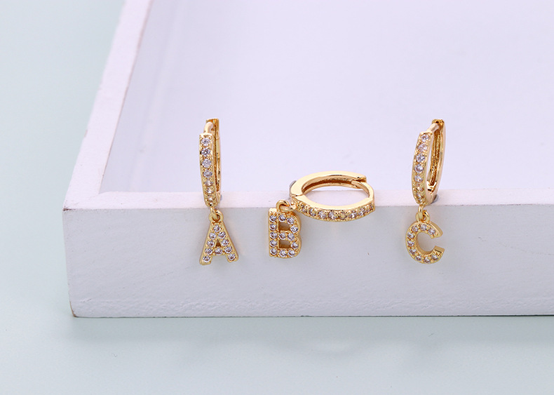 5g Weight Zircon Inlay Material Earrings Classification Anniversary, Business, Wedding, Travel, Birthday, Festival Occasion Copper Material Letter Pattern Women'S Gender Inlaid Zircon Design Fashion Style Gold Color Fashion New Zircon 26 English Letters Single Earrings 7
