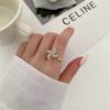 Rotating adjustable windmill toy, fashionable brand ring, on index finger, light luxury style