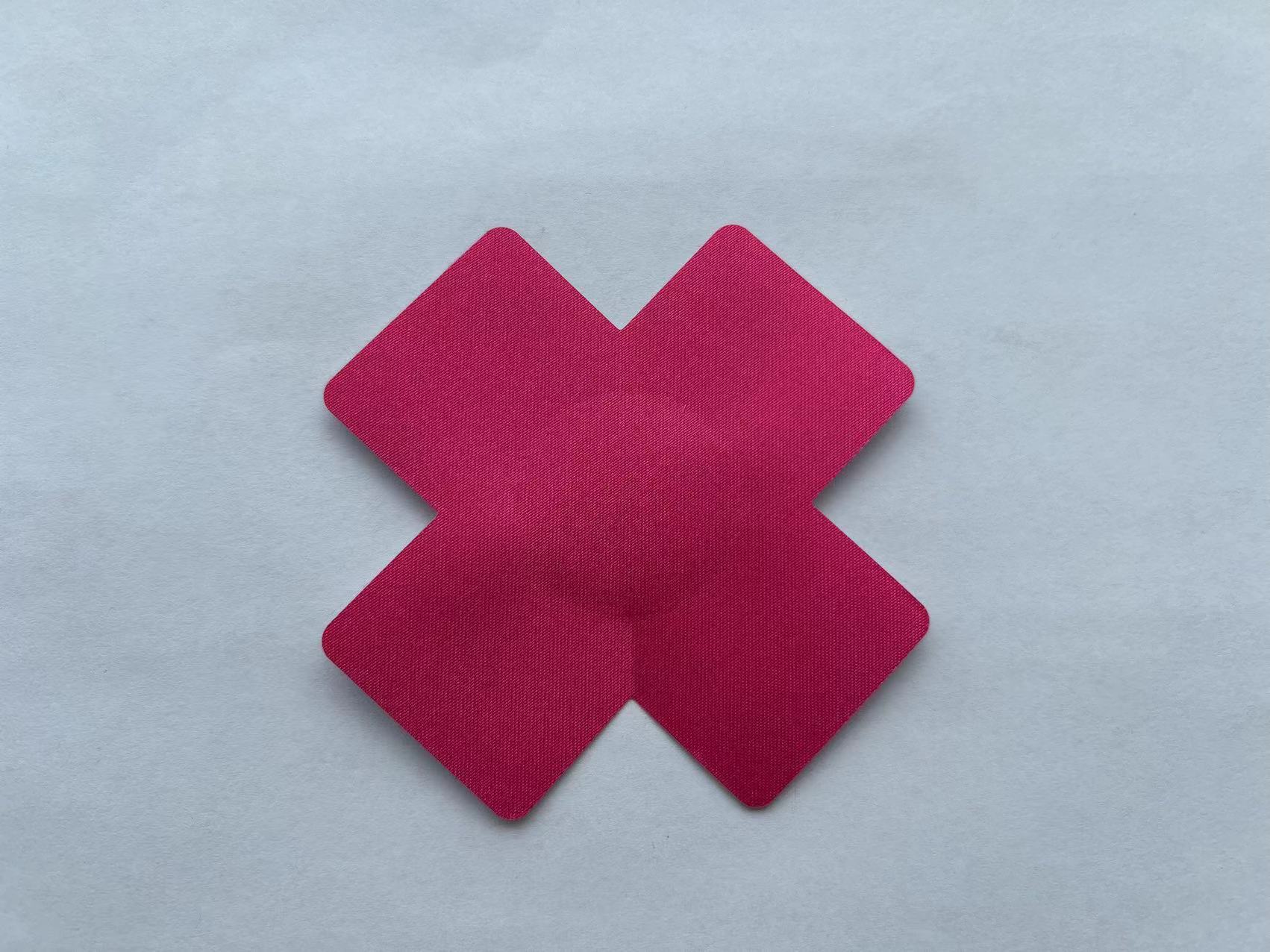 Venta caliente transfronteriza europea y americana sexy impreso mama pegatinas desechables en forma de X pecho Nipe cubre