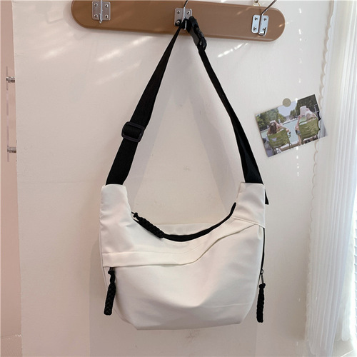 Japanese-style literary nylon dumpling bag, large capacity new fashion commuting crossbody bag, trendy solid color single-shoulder bag, wholesale