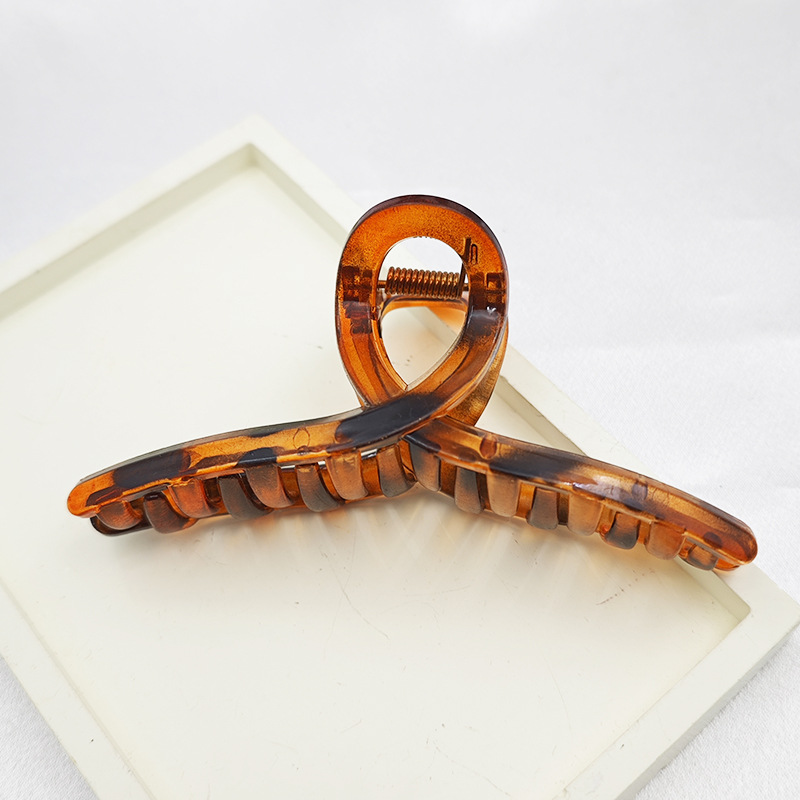 Explosiones transfronterizas leopardo abrazadera de cabello de gran tamaño abrazadera de cabello de plástico detrás de la cabeza abrazadera de cabello abrazadera de tiburón abrazadera al por mayor