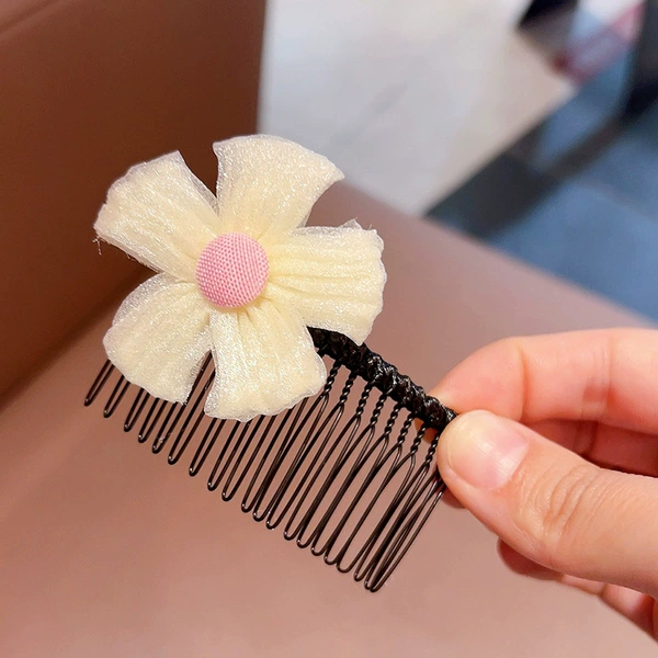 One little flower of beige mesh gauze