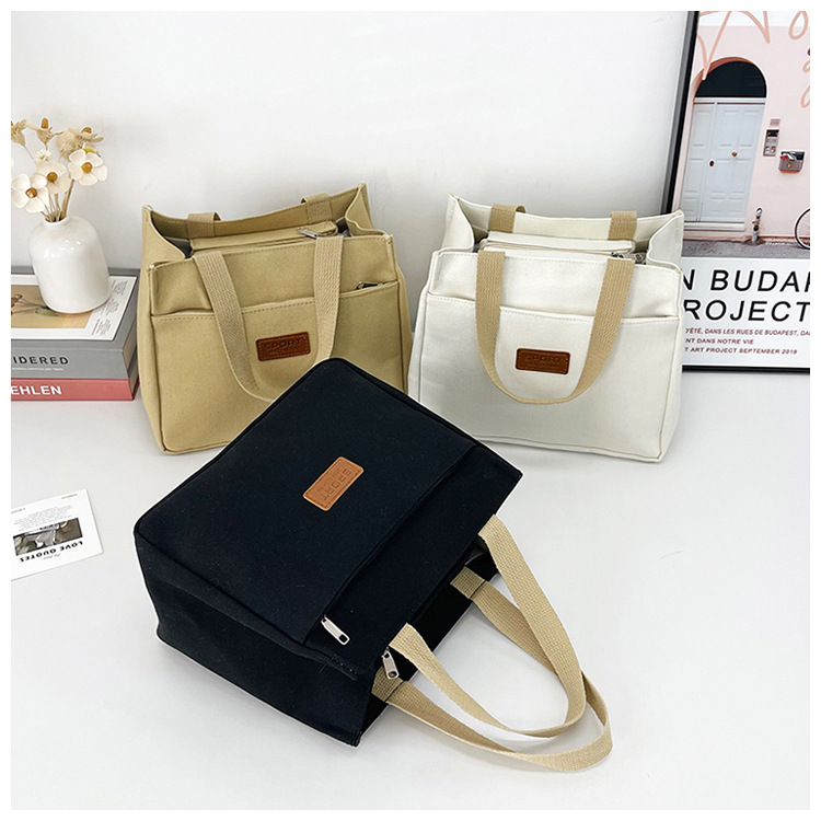 New wholesale fashionable and high-quality canvas handbag, simple and portable, easy to carry for going out, versatile lunch box and bento bag undefined