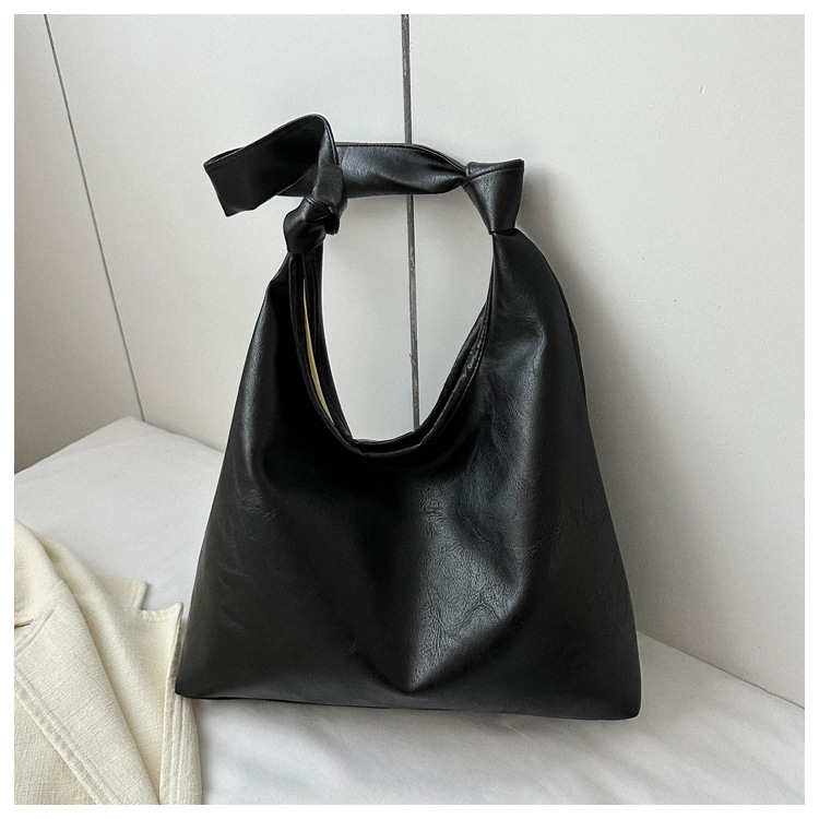 Moda europea y americana de alta textura retro bolsa de mujer 2023 invierno nuevo nicho diseño pu hombro bolsa de las axilas