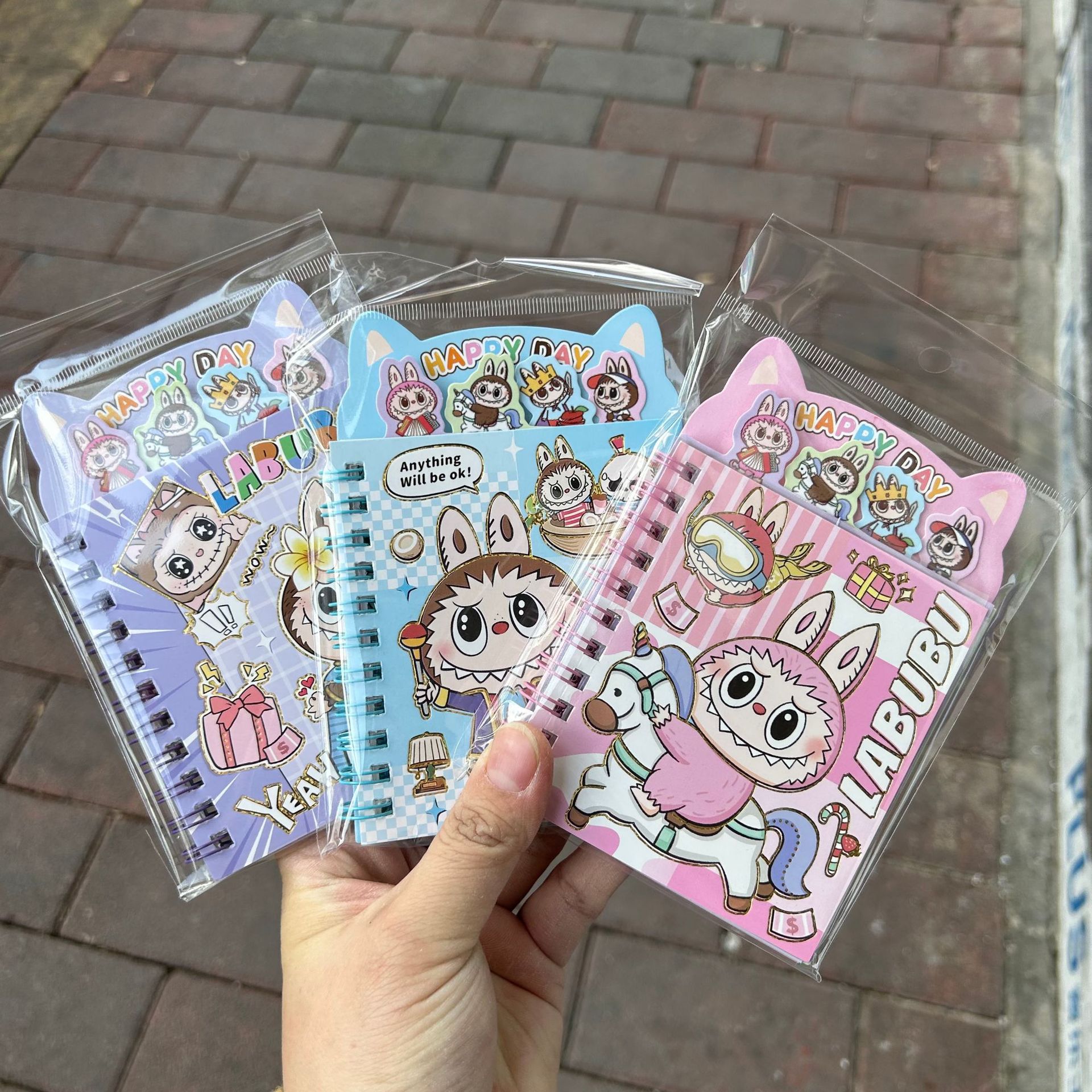 Sanrio hermosa clasificación de forma de bobina de dibujos animados mini bolsillo cuaderno regalo de jardín de infantes