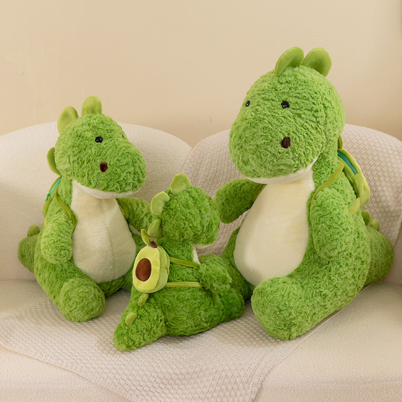 Nuevo aguacate mochila dinosaurio juguetes de peluche muñecas chicas regalo juguetes para niños muñecas de dibujos animados máquina de muñecas