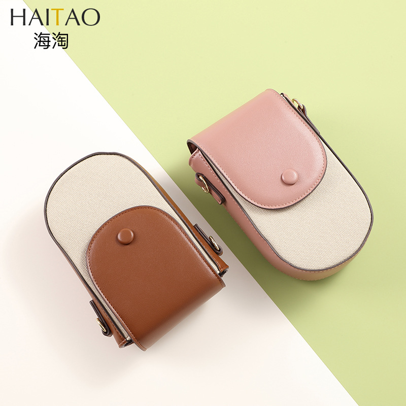 Bolso bandolera Mujer Versión coreana de la moda patrón de lona Versión vertical de la bolsa de teléfono móvil con múltiples tarjetas Versión coreana simple Bolso diagonal de un solo hombro al por mayor