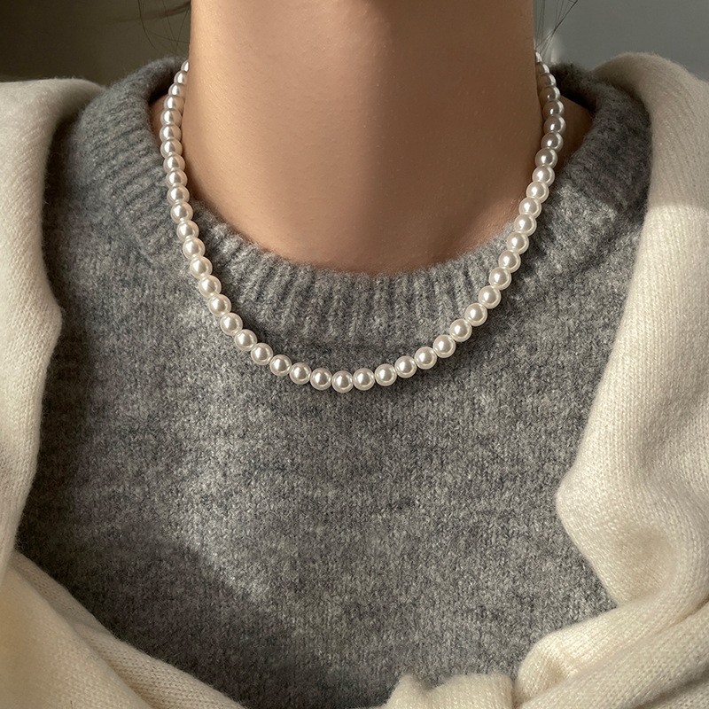 Collar de perlas con lazo de flor con cuentas francesas Elegante cadena de clavícula con sentido de alta gama retro ligero decoración de lujo femenino