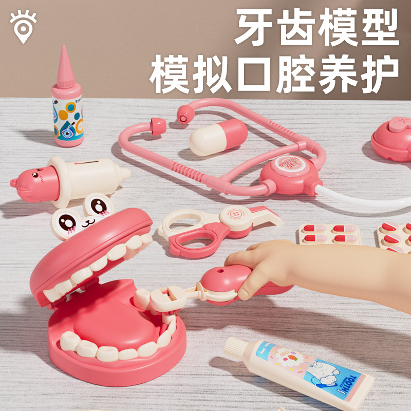 Un conjunto de juguetes para niños pequeños médicos, niños y niñas, juguetes dentales para bebés jugando con estetoscopio en casa