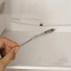 Galvanized spring tube refrigerator unclogger, cleaning tool for clearing ice and water accumulation in refrigerator's cold storage compartment drain holes.