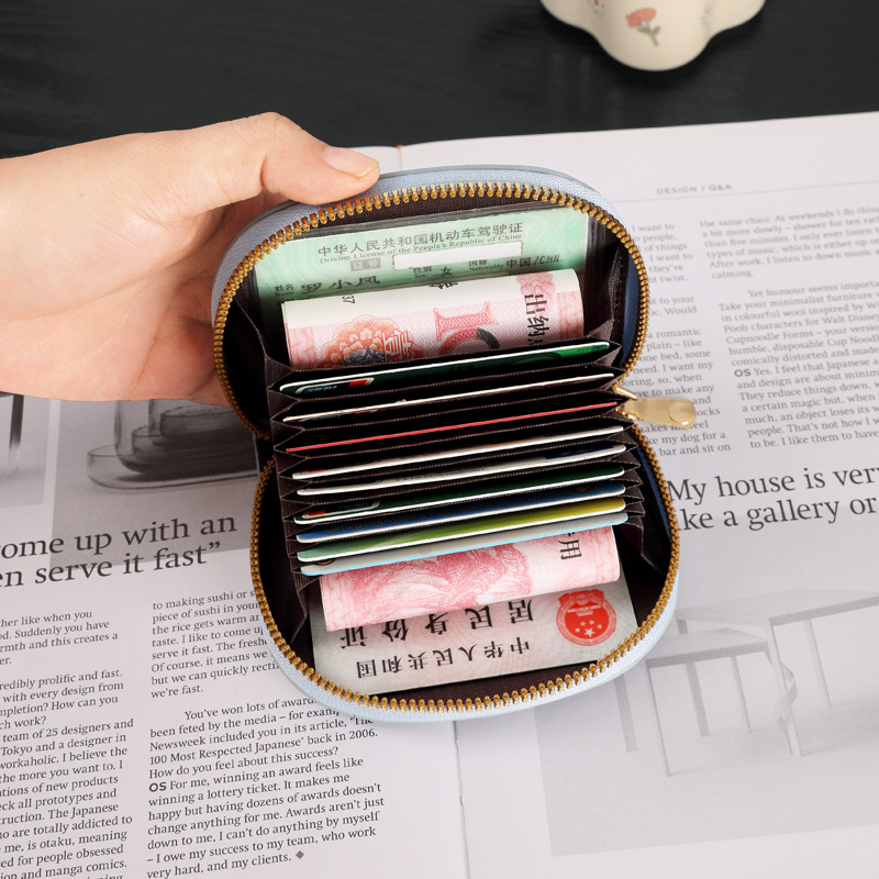 Fábrica directa 2023 nuevo bolso de cambio para mujeres coreanas lindas bolsas de cremallera de bolsas de monedas mini