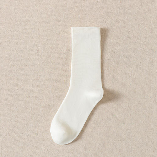 New multi-color cotton pile socks for women ins fashion solid color boneless socks mid-length spring, summer and autumn confinement socks wholesale