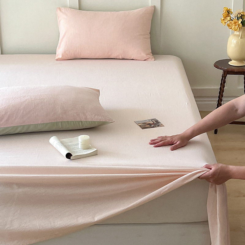 Nueva sábana de algodón puro sábana de algodón funda de cama de una pieza protectora de colchón cama de dormitorio antideslizante juego de tres piezas 1,5 metros