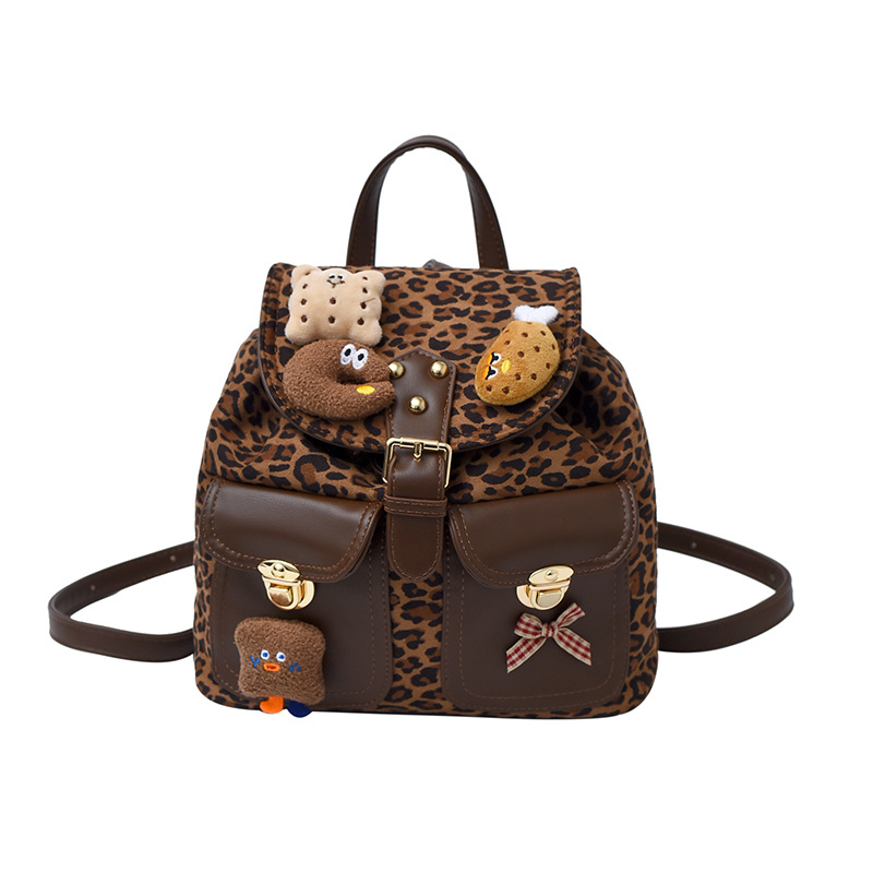 Moda leopardo mochila para niños y niñas lindo muñeca de peluche colgante mochila para niños otoño y invierno nueva mochila para niños