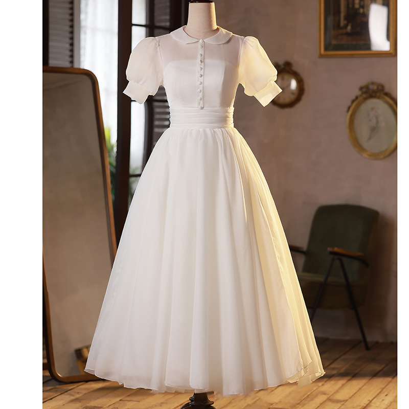 2024 invierno nuevo viaje Retro Luz vestido de novia Hepburn Hong Kong estilo simple moda blanco al aire libre hilado fábrica suministro