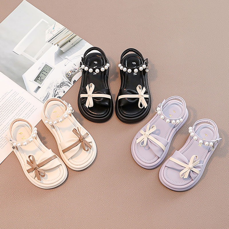 Niñas sandalias de dedos abiertos 2026 verano nuevo estilo de moda para niños zapatos de playa para niños zapatos princesa de perlas
