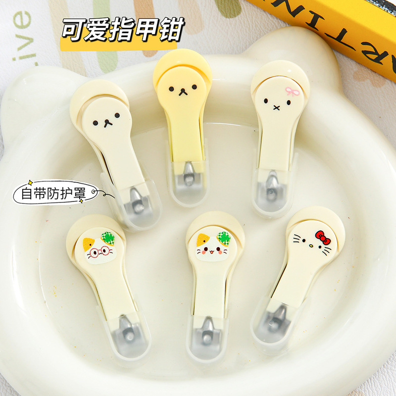 Cute cartoon print nail clippers with protective cover, anti-splash nail cutter, portable nail trimmer Cute cartoon print nail clippers with protective cover, anti-splash nail cutter, portable nail trimmer