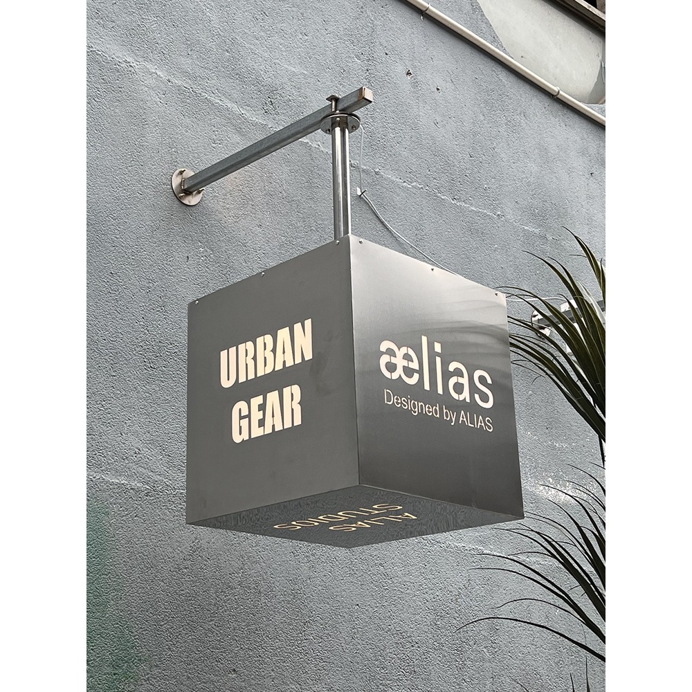 Instagram-style creative stainless steel hollowed-out rotating lightbox, outdoor advertising lightbox, wall-mounted side sign lightbox.