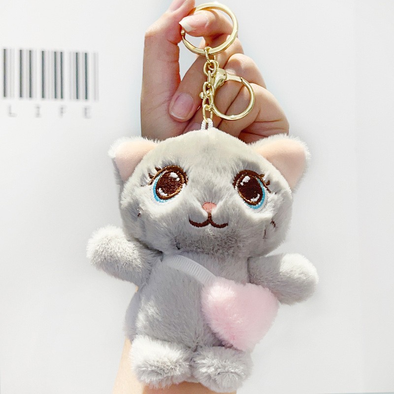 Cuatro pulgadas muñeca máquina colgante felpa llavero lindo muñeca mochila adornos grab máquina muñeca regalo al por mayor