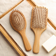 Manufacturer Nantong bamboo airbag comb female head meridian massage comb large board comb straight hair comb logo 