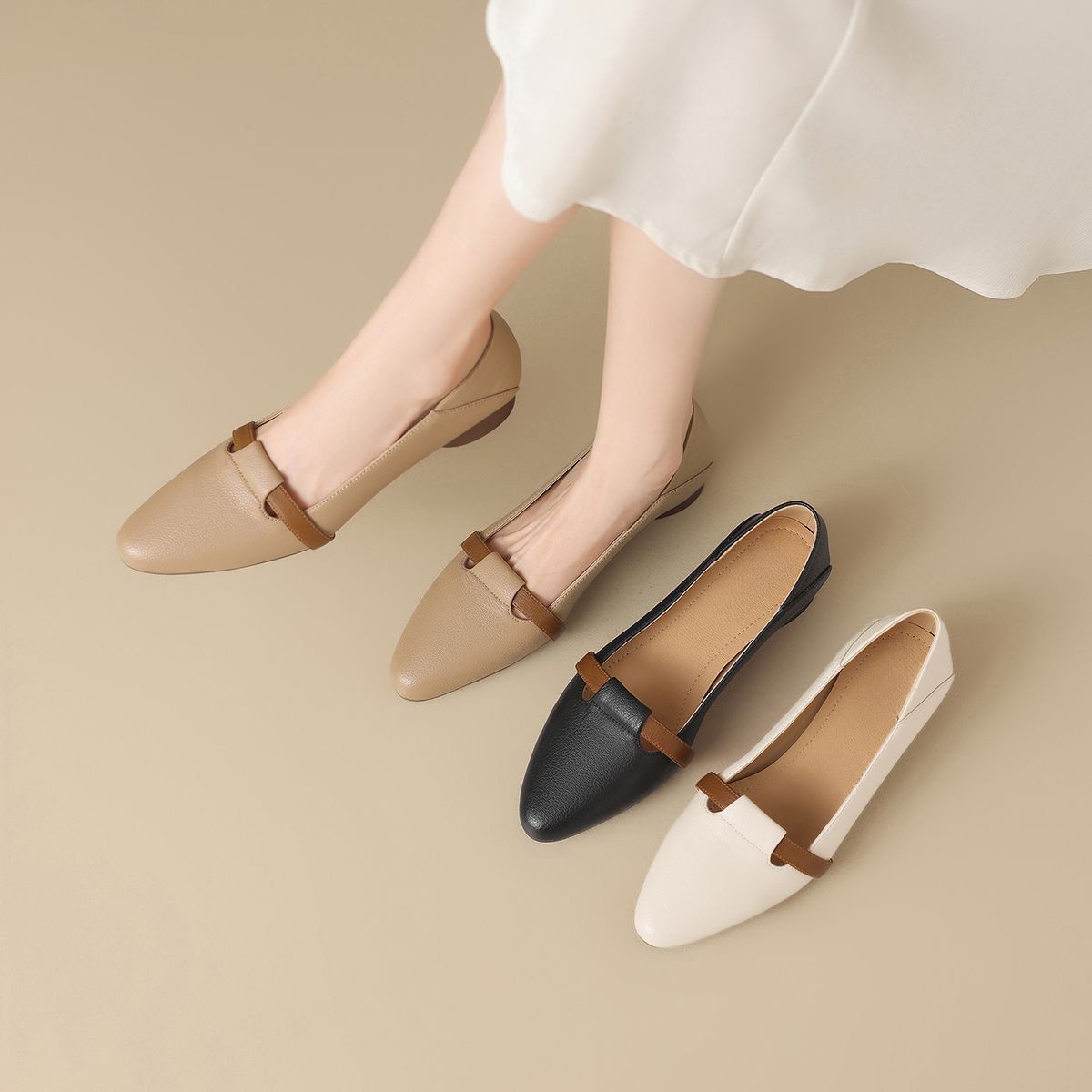 La primavera y el verano de 2026 nuevos zapatos de cuero de talón bajo puntiagudo, zapatos de soja, zapatos de estilo único.