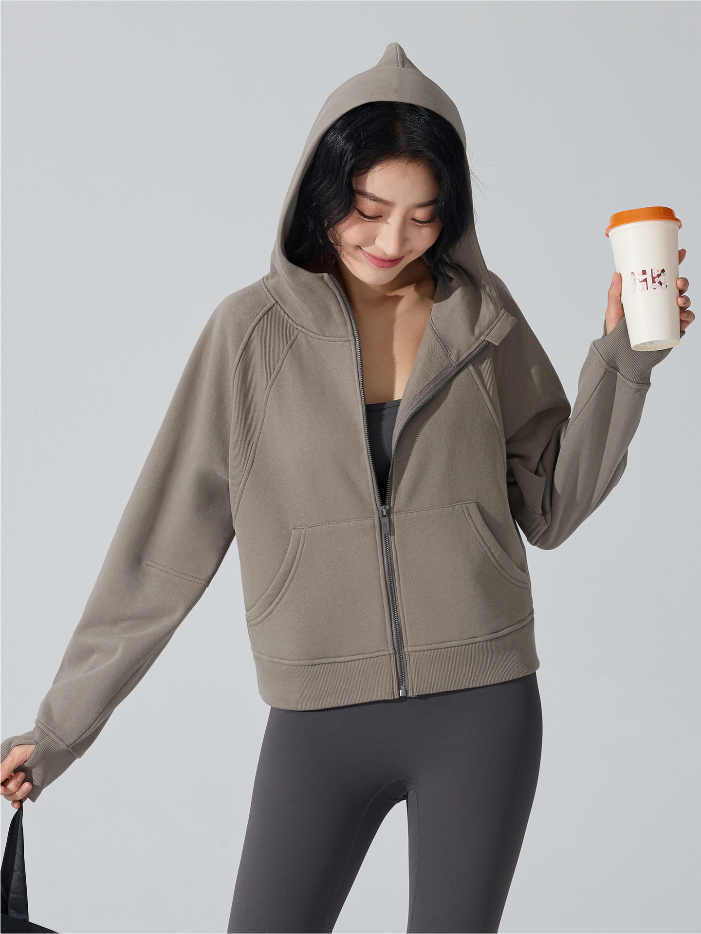 Otoño y invierno de moda con cremallera camiseta encapuchada calentadora y camiseta deportiva casual universal cardigan chaqueta de yoga superior mujer
