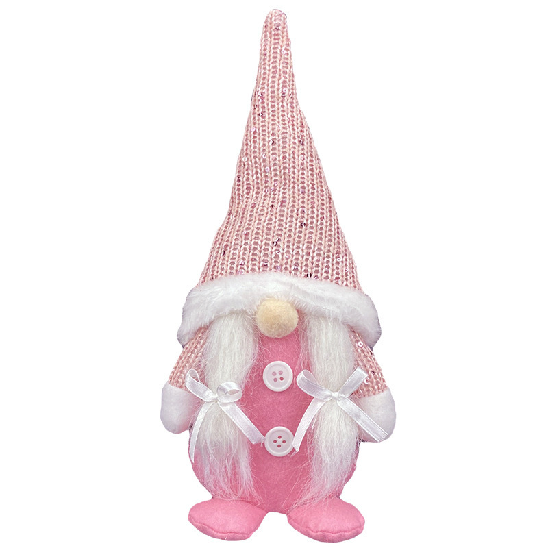 顔のない老人の子供のショーウインドーはクリスマスの装飾品を飾っています。|undefined