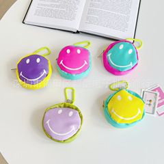 キャンディー色の笑顔のイヤホンはファッションブランドのネットの赤いキーはかわいいミニの小さい包みのペンダントを包んで個性の贈り物を飾ります。