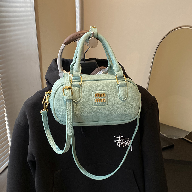Bolsa de bolos retrógrada 2026 nueva moda ligera de lujo bolso cuadrado bolso de hombro universal