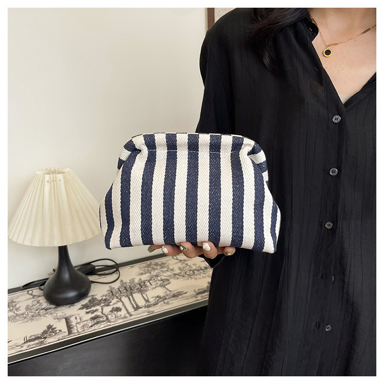 New cross-border fashion color-blocking striped cosmetic bag, women's loose change mobile phone storage bag, trendy and niche cloud clutch undefined