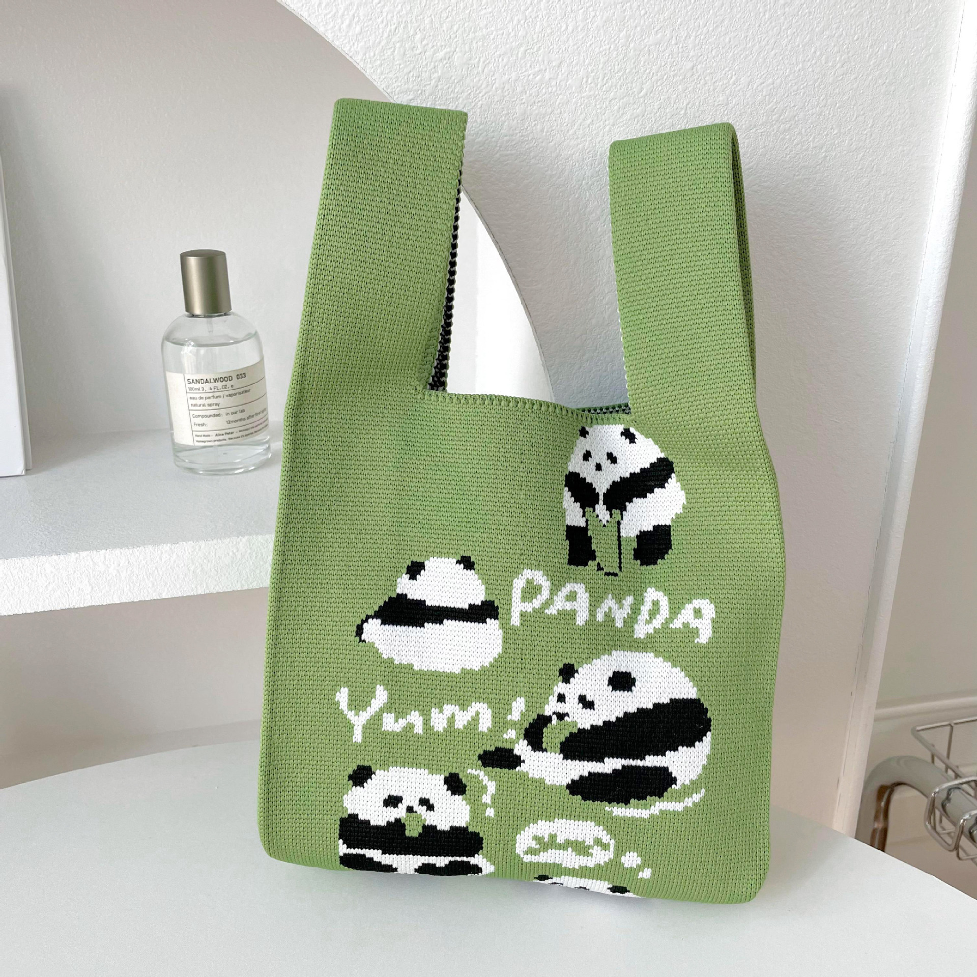 Bolsas de nicho de diseño de pandas lindos bolsas de mano de punto bolsas de mano estudiantes personalidad bolsas de brazo fábrica al por mayor