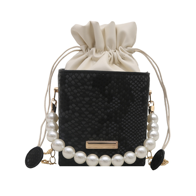Mini bolso de cubo hermoso bolso con cordón de perlas de aire occidental para mujer 2025 nuevo bolso de mensajero de un solo hombro con cadena portátil