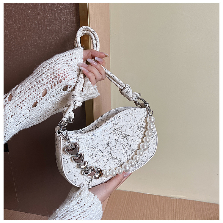 French chain armpit bag, women's high-end sense, niche trendy fashion handbag, western-style crescent bag_voghion.com
