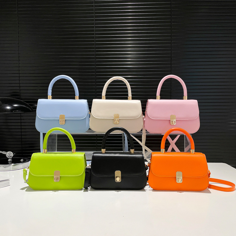 Bolso de sillín de diseño de nicho coreano 2025 nuevo bolso de color sólido de gran capacidad bolso de mensajero de hombro retro