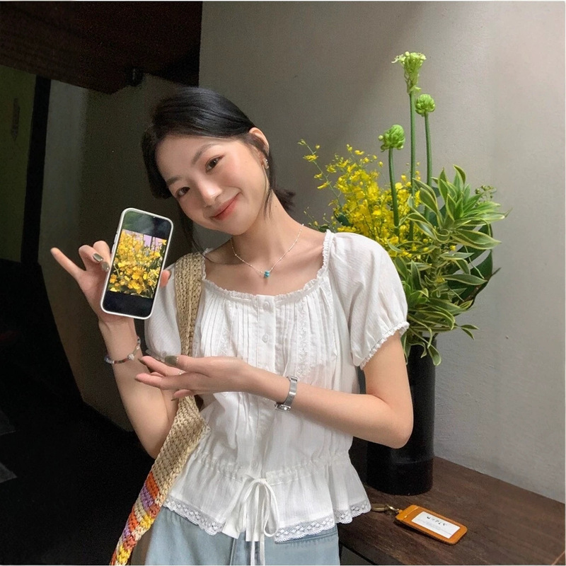 French-Style Sweet Lace-Up Short-Sleeve Shirt for Women, New Summer Model with Puff Sleeves, Round Neck, and Lace Trim, Waist-Cinching Blouse French-Style Sweet Lace-Up Short-Sleeve Shirt for Women, New Summer Model with Puff Sleeves, Round Neck, and Lace Trim, Waist-Cinching Blouse