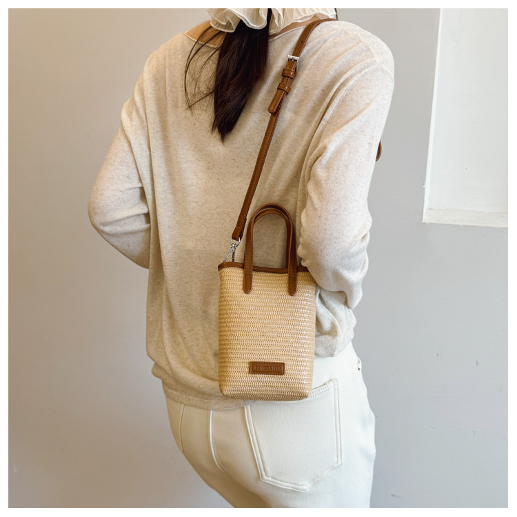 Summer straw woven beach bag 2025 New style seaside vacation handbag, simple and versatile bucket bag, woven crossbody bag undefined